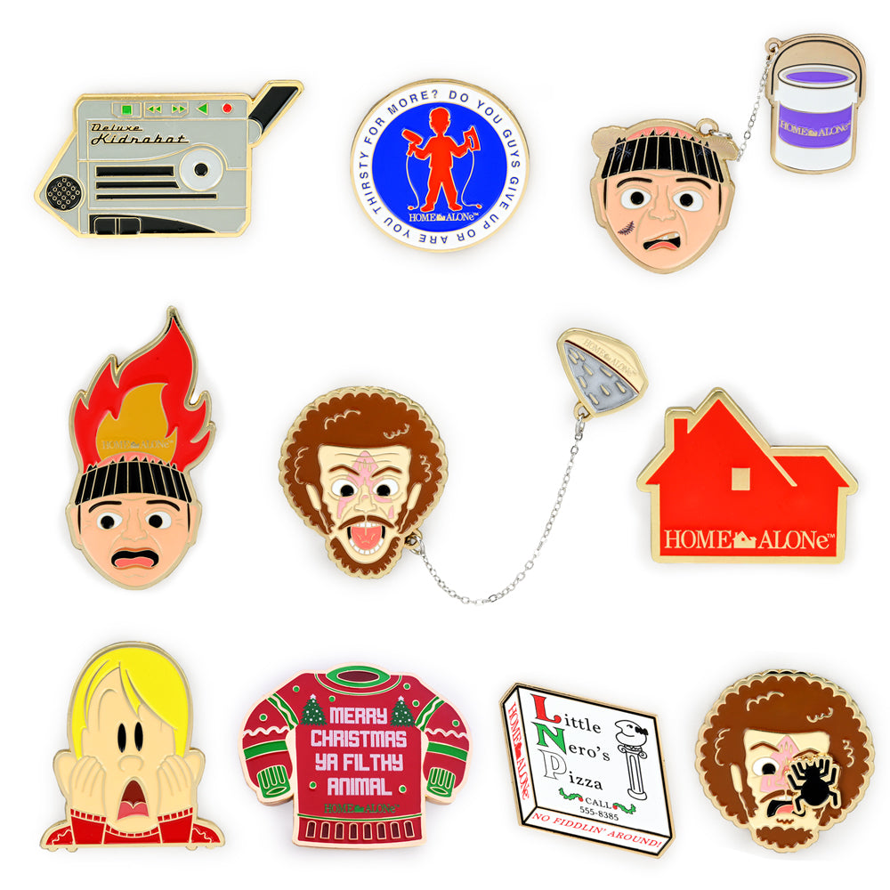 Kidrobot x Home Alone 30th Anniversary enamel pins featuring Little Nero's Pizza in vibrant, multi-color design.
