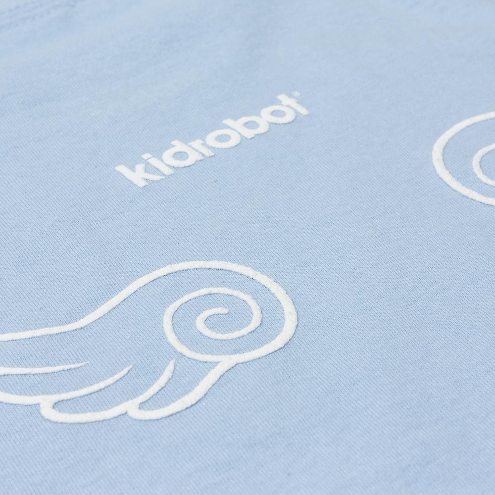 Sanrio Kidrobot x Hello Kitty Bittersweet T-shirt featuring colorful Hello Kitty artwork by Candie Bolton, casual apparel for kids and adults.