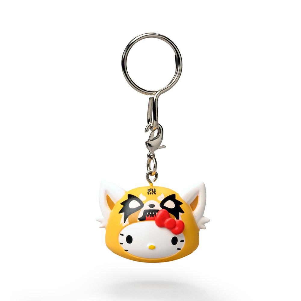 Sanrio Kidrobot Hello Kitty Time to Shine keychain featuring a colorful Hello Kitty design on a metal keyring.