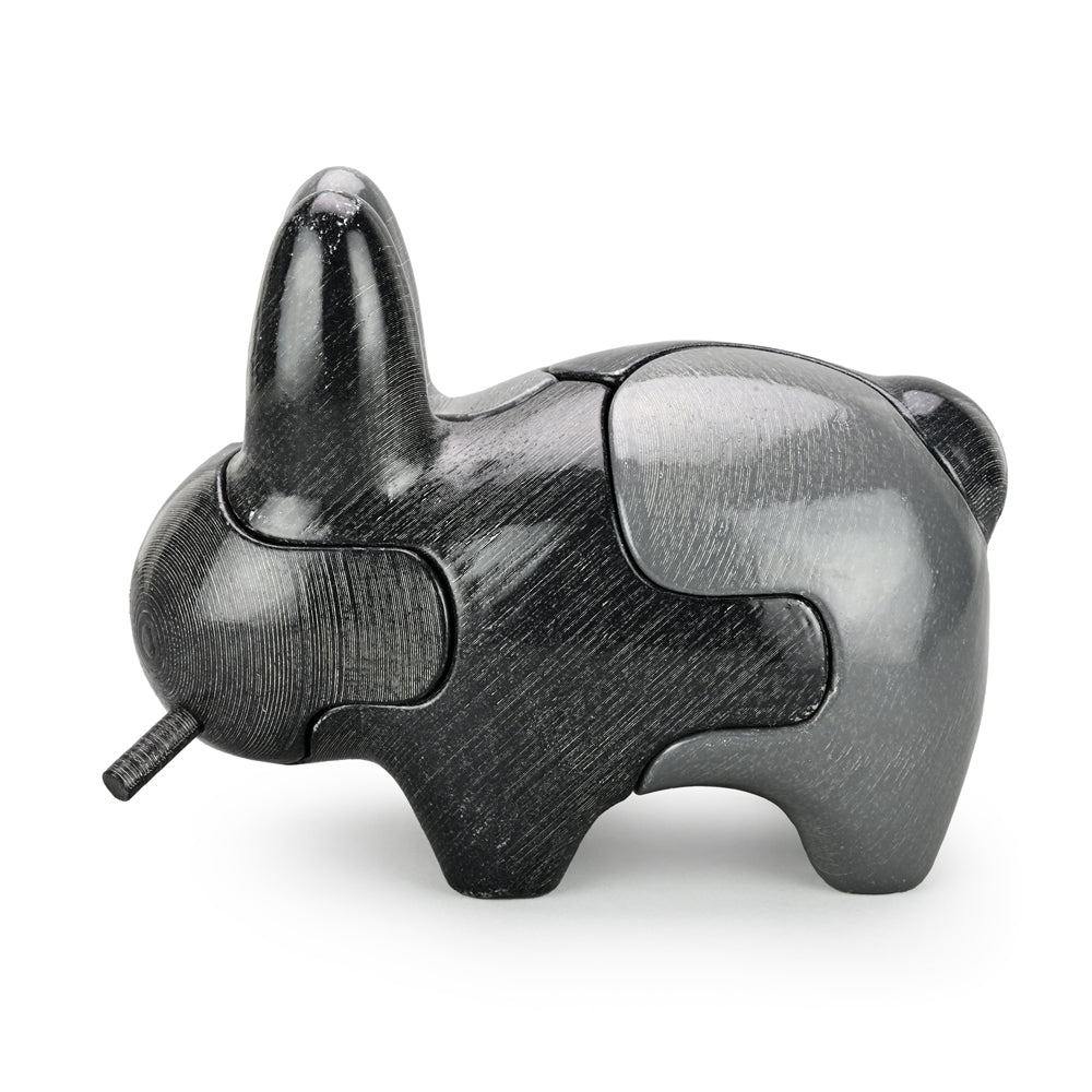 Locknesters Interchangeable Puzzle Labbit No. 1 collectible figure with customizable parts, depicted in the product image.