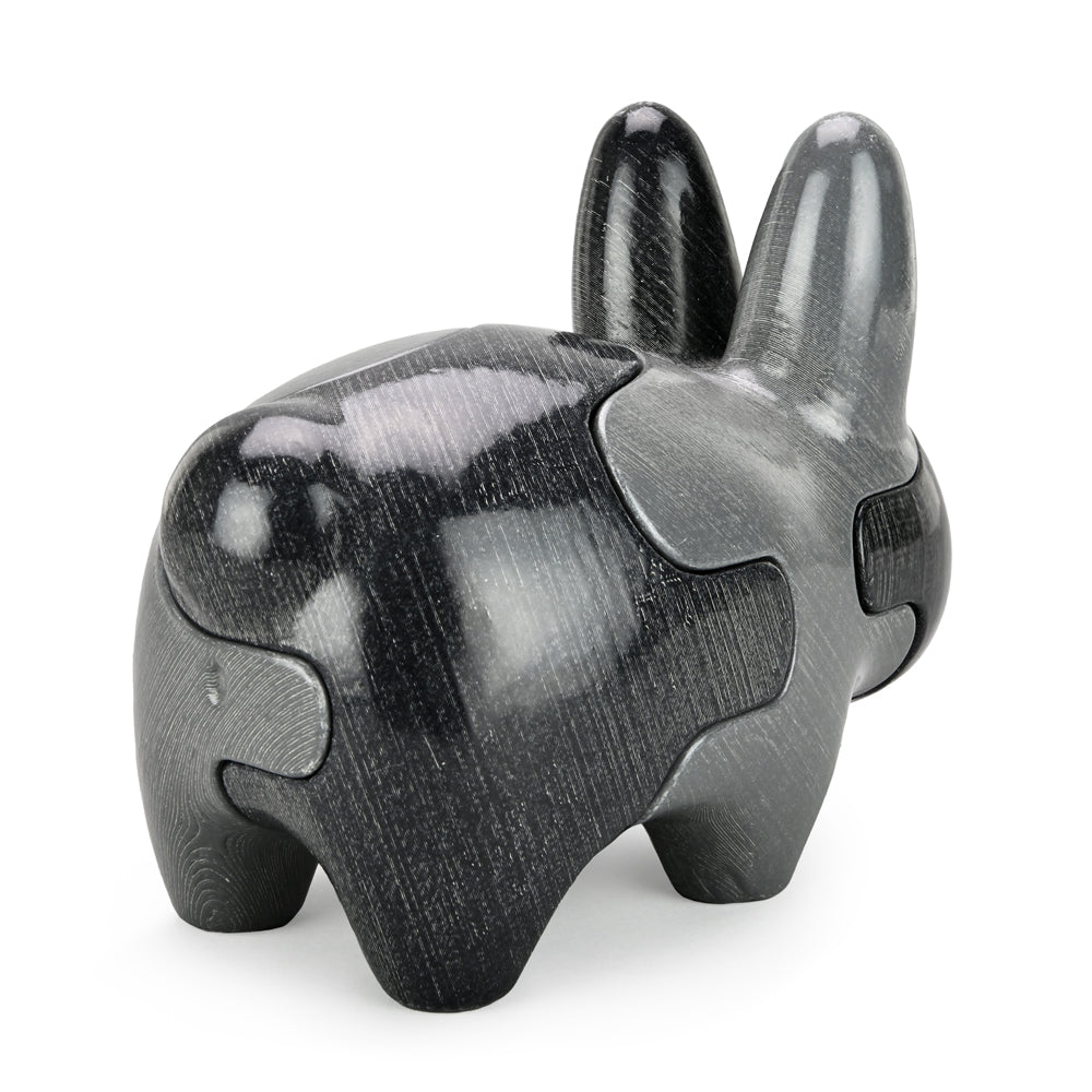 Locknesters Labbit puzzle toy with interchangeable parts, featuring a playful, stylized rabbit design and vibrant colors.