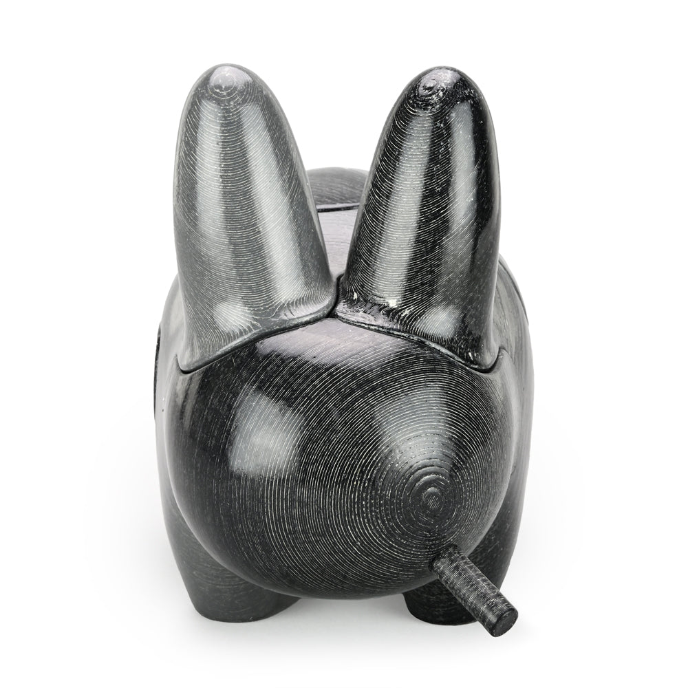 Locknesters Interchangeable Puzzle Labbit No. 1 figure with customizable puzzle face and playful design.