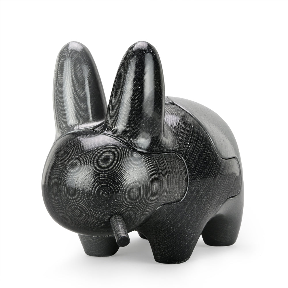 Locknesters Interchangeable Puzzle Labbit No. 1 collectible figure with customizable features and playful design.