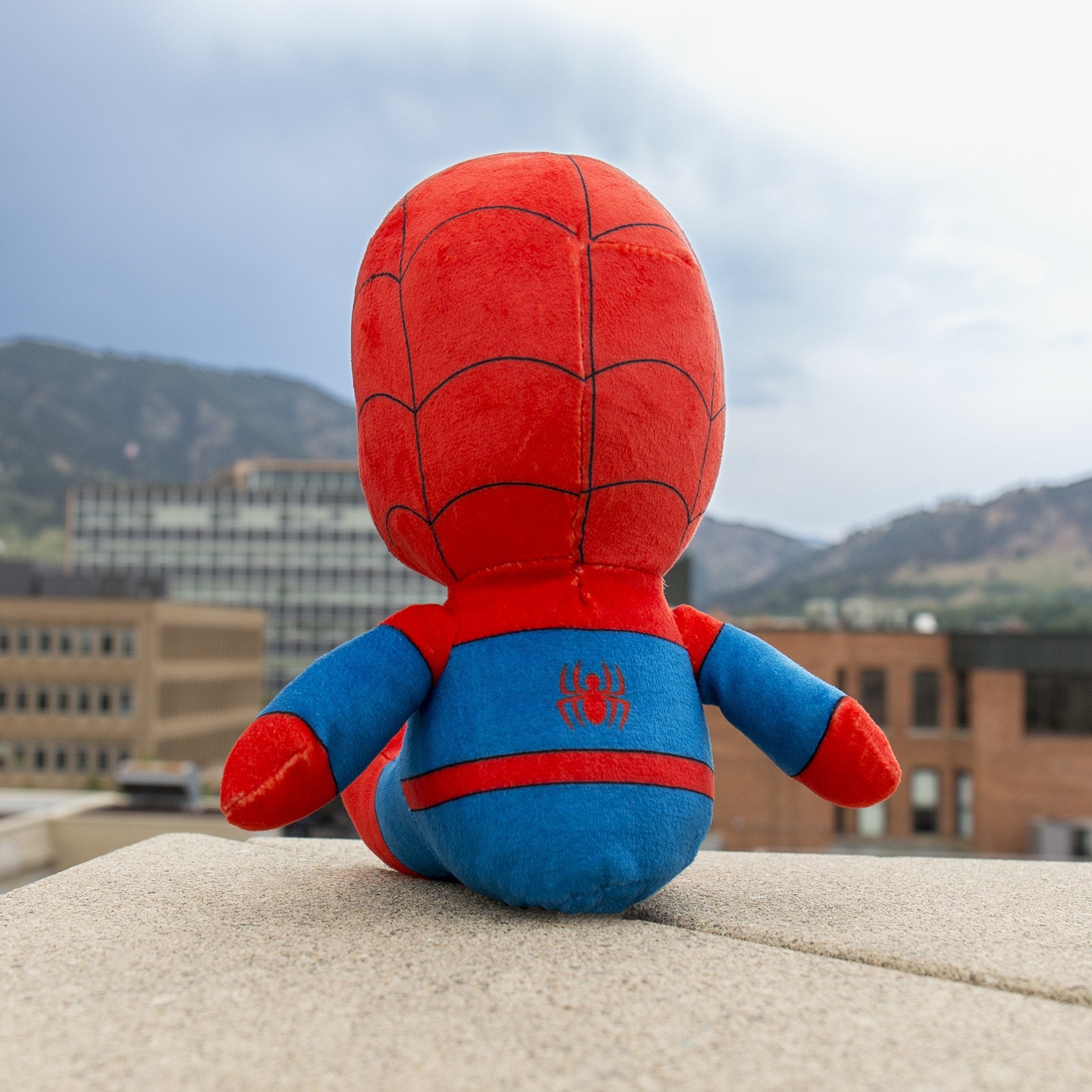 Marvel Spider-Man Phunny plush by Kidrobot featuring a soft, cuddly Spider-Man character with detailed costume and expressive eyes.