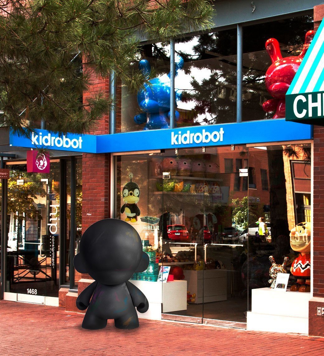 Kidrobot MUNNYWORLD Monsta Munny 4-foot art giant chalkboard edition, showcasing a large, customizable art figure with chalkboard surface.