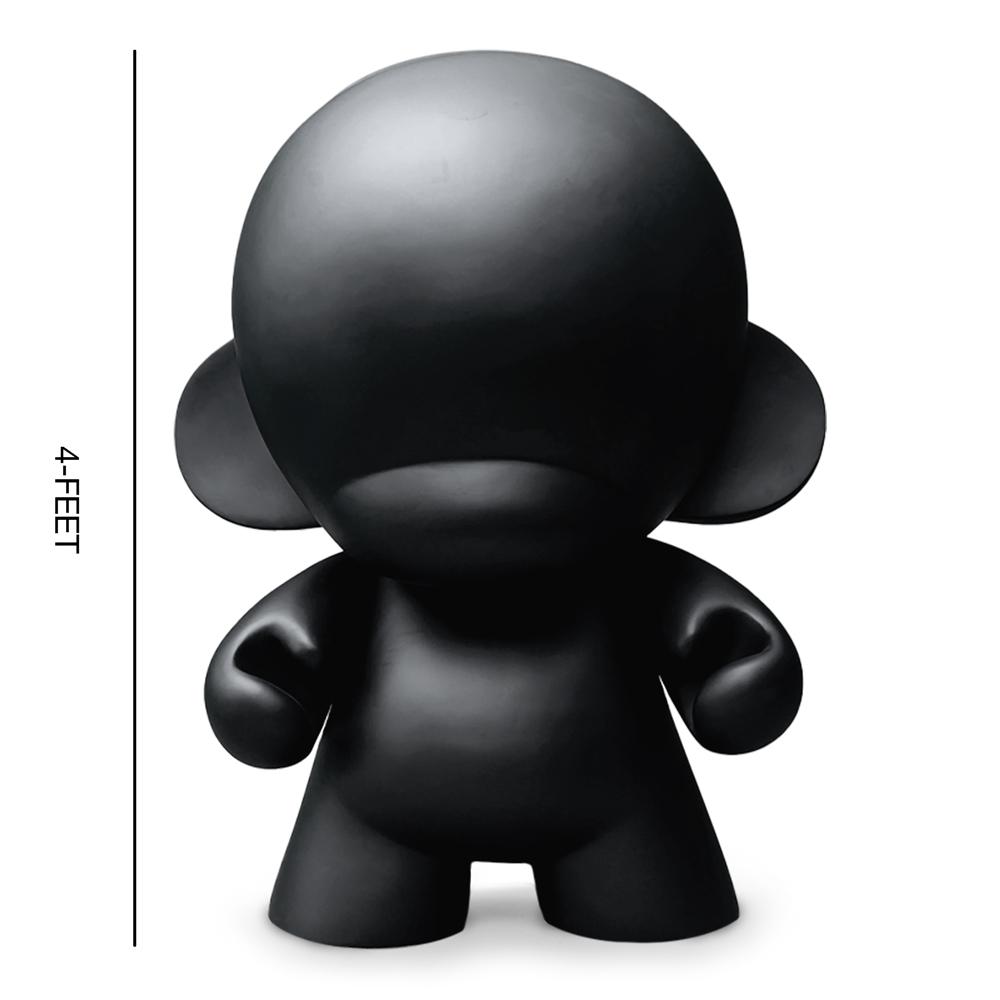 Kidrobot MUNNYWORLD Monsta Munny 4-foot art giant chalkboard edition, featuring a colorful, sculpted vinyl figure with chalkboard surface.