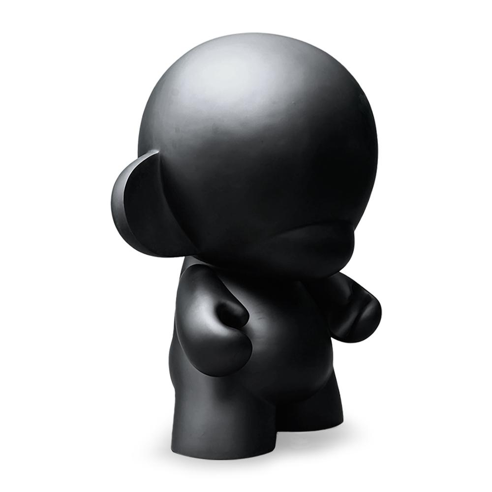 Kidrobot MUNNYWORLD Monsta Munny 4-foot art giant chalkboard edition, featuring a large, colorful painted monster figure.