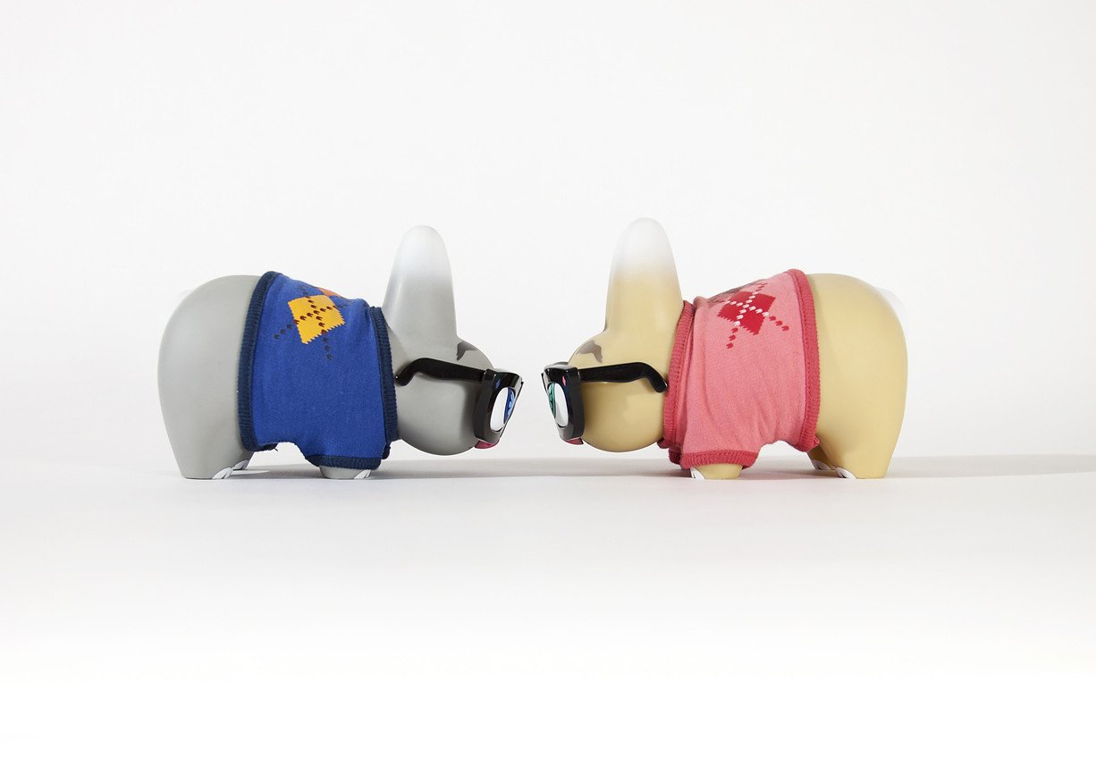 Red Pipken Preppy Labbit art vinyl figure by Scott Tolleson, featuring a stylish and colorful collectible toy with detailed design elements.