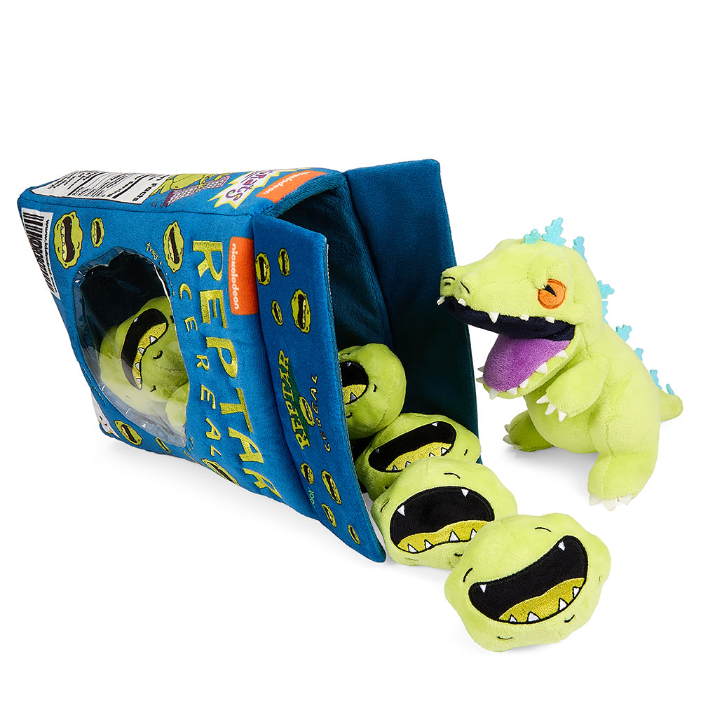 Rugrats 10-inch plush Reptar toy resembling a cereal box, soft and interactive plush from the Rugrats series.