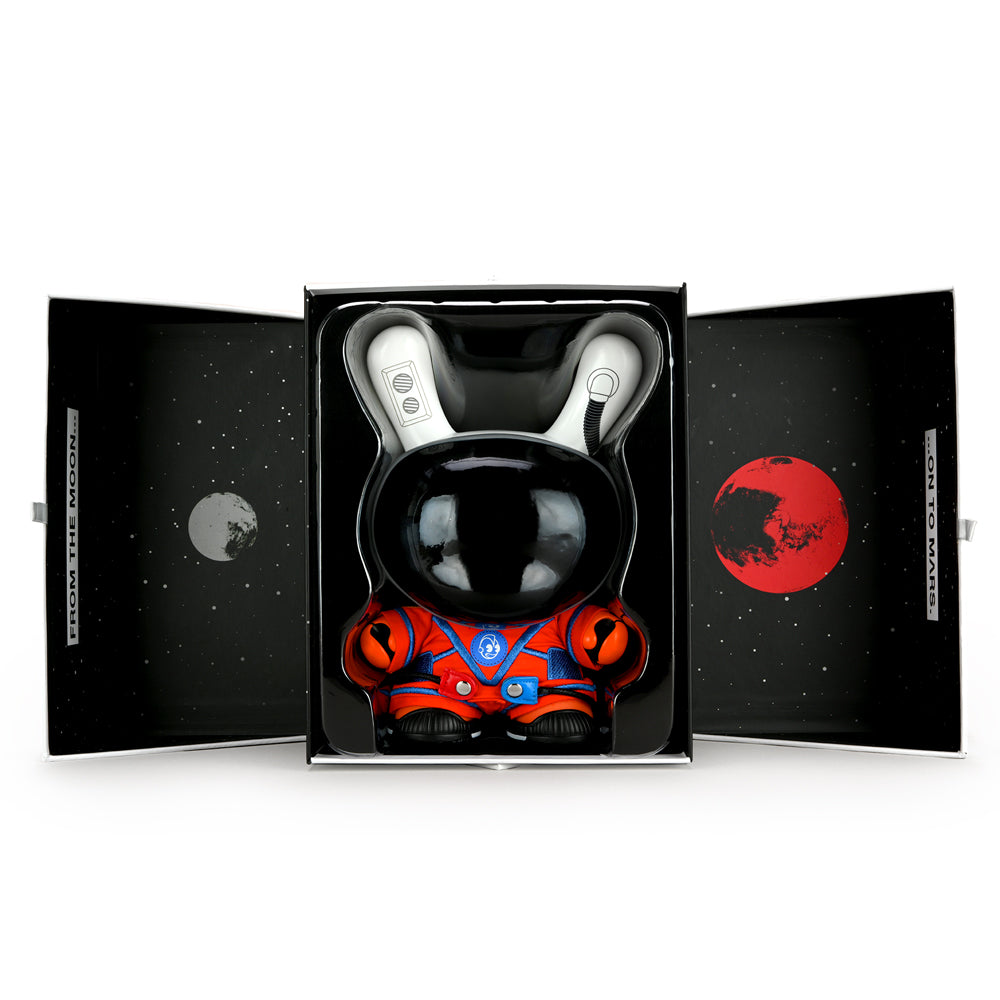 Kidrobot SDCC 2021 Stars My Destination 8-inch Astronaut Dunny Con Exclusive Orion Edition vinyl figure on display.