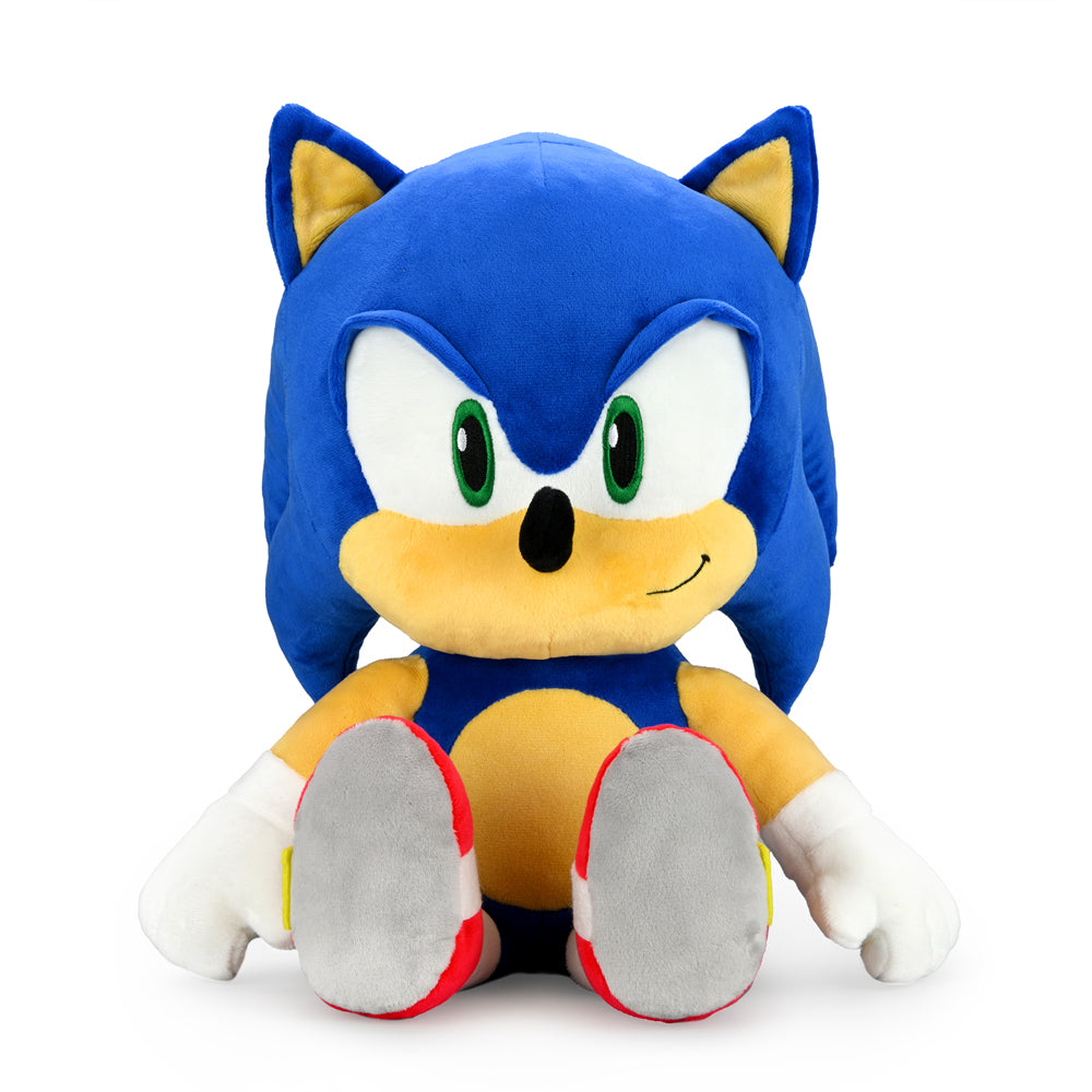 Sonic the Hedgehog HugMe Shake Action Plush toy showing Sonic with arms outstretched and a playful expression.