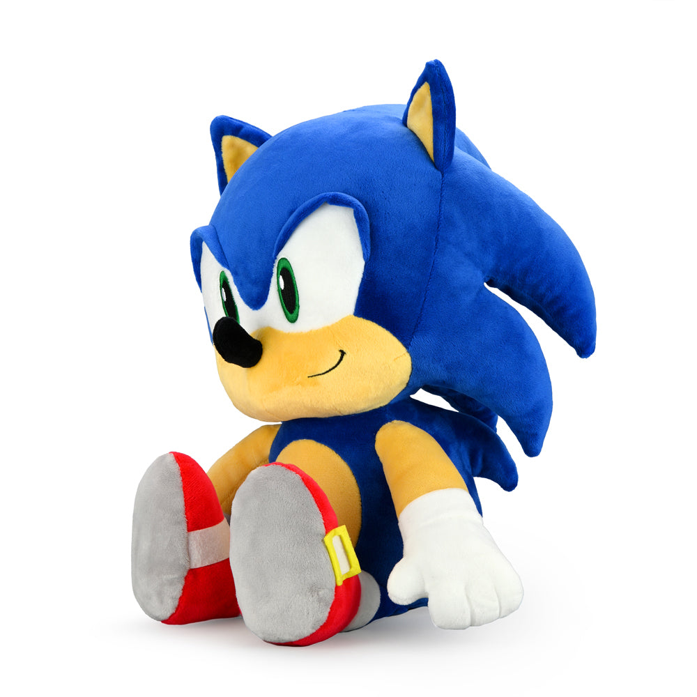 Sonic the Hedgehog HugMe Shake plush toy featuring Sonic in a cuddly, soft plush design with detailed character features.
