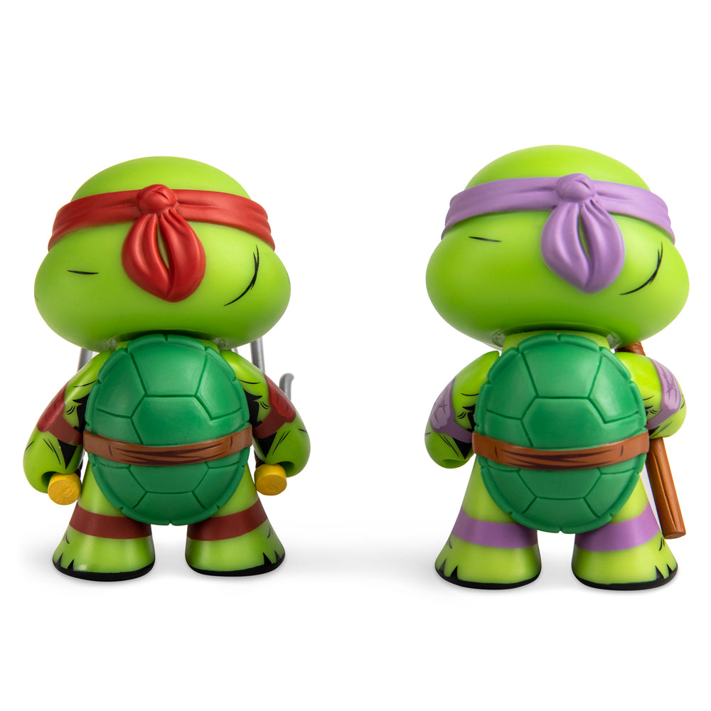 Teenage Mutant Ninja Turtles Raphael and Donatello 3-inch vinyl mini figures 2-pack, featuring detailed character designs.