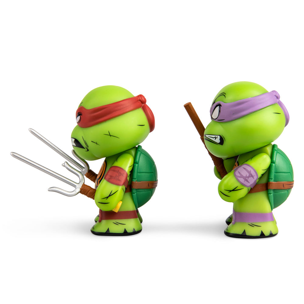 Teenage Mutant Ninja Turtles Raphael and Donatello 3-inch vinyl mini figures 2-pack, detailed collectible figures on display.