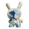 The Met 3-Inch Showpiece Dunny featuring Hokusai Great Wave design, collectible vinyl art figure with detailed wave artwork.