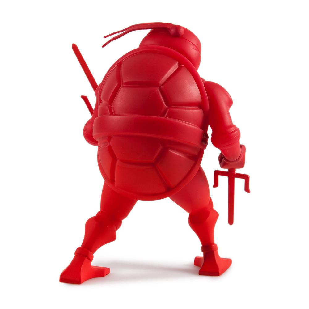 Teenage Mutant Ninja Turtles Raphael 8-inch vinyl art figure by Kidrobot, featuring detailed sculpt and vibrant colors.