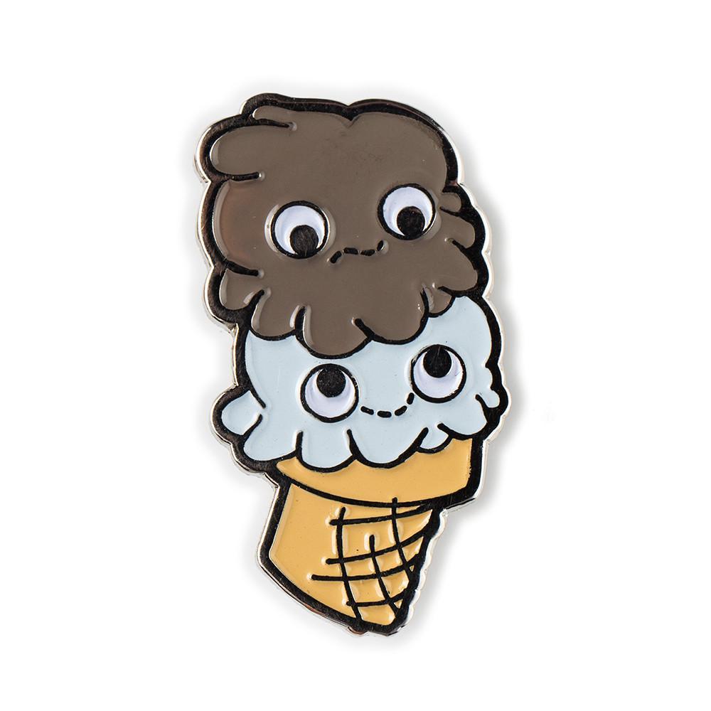 Yummy World Collectible Mystery Enamel Pins featuring colorful, playful character designs on a white background.