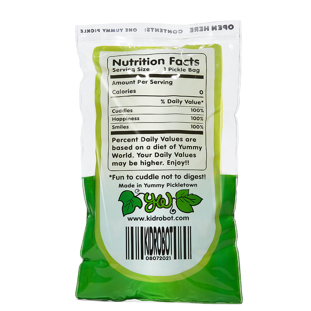 Yummy World Crunchy Pickle plush toy in a bag, 10-inch interactive soft stuffed animal featuring a pickle character.