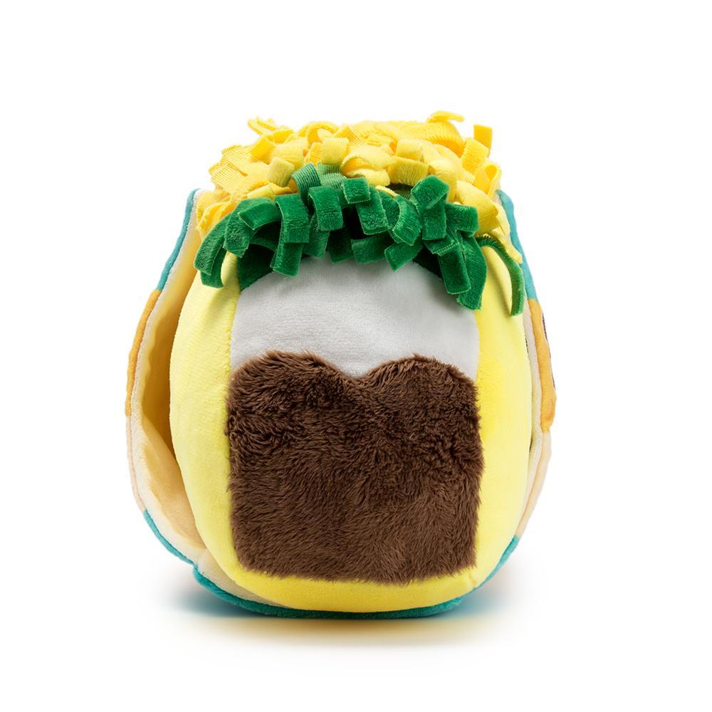 Yummy World Flaco Taco medium plush toy featuring a colorful taco character with a smiling face and soft fabric texture.