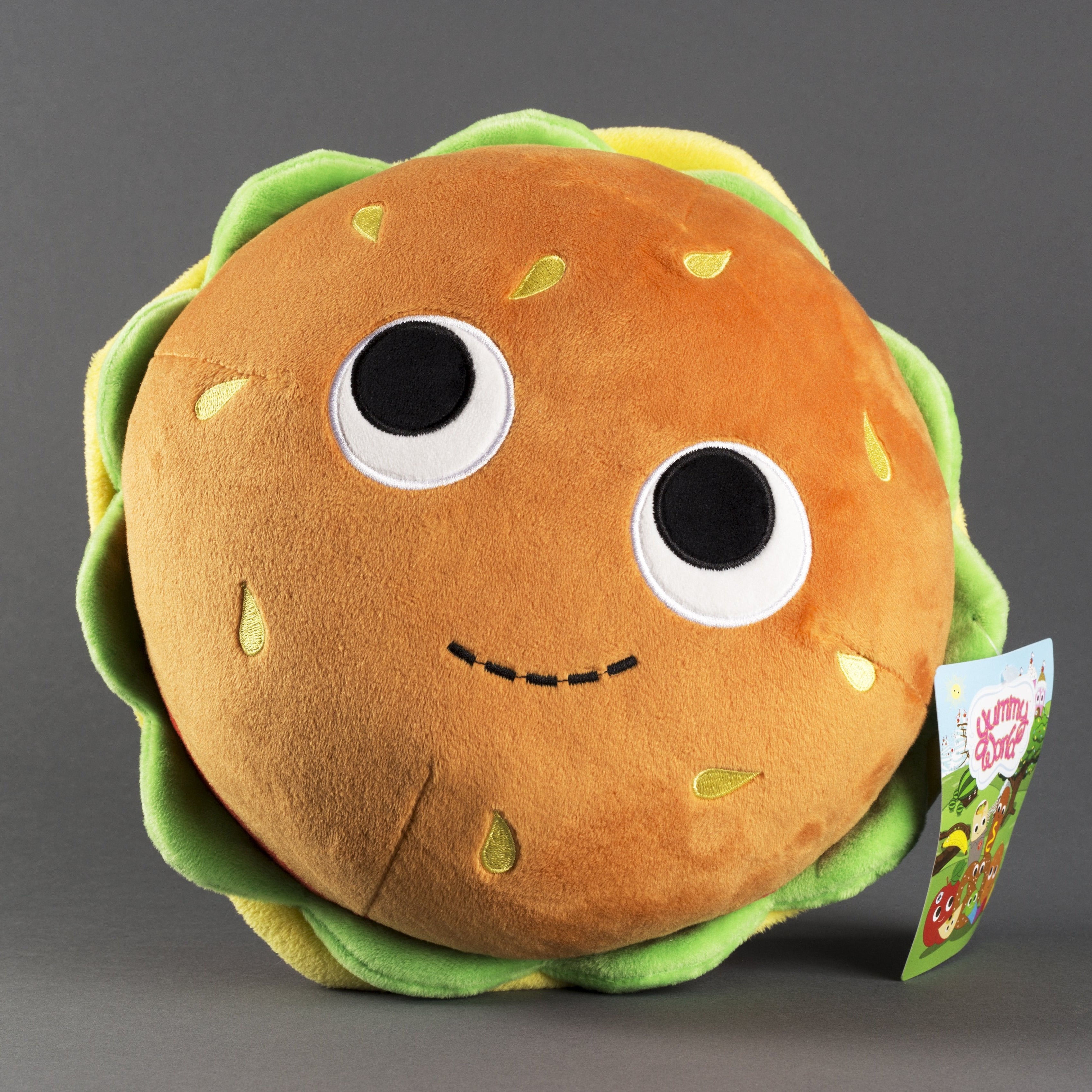 Yummy World Burger plush toy featuring a soft, colorful burger design with bun, lettuce, cheese, and patty details.