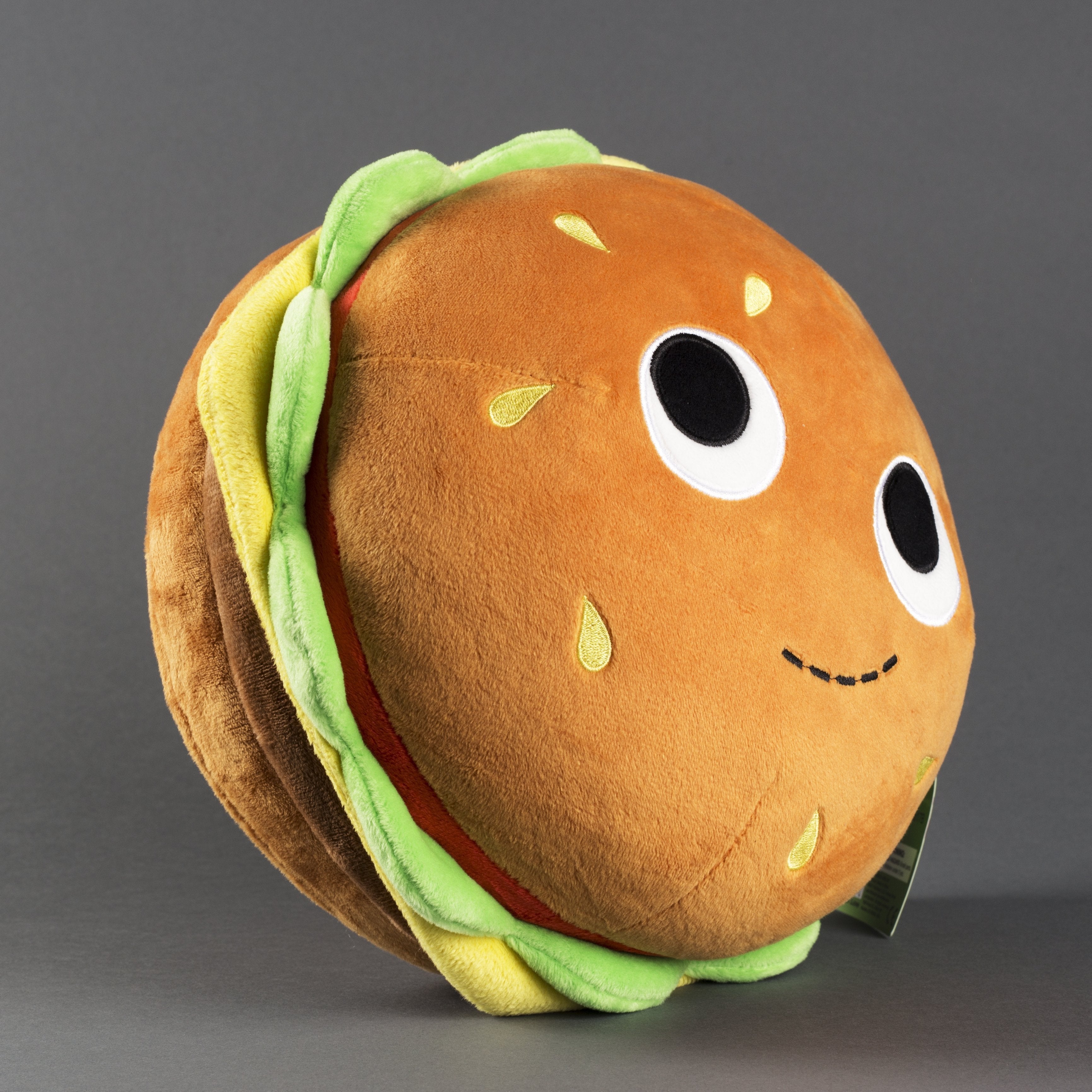 Yummy World Burger Plush toy with soft, colorful fabric depicting a burger with bun, lettuce, cheese, and patty details.